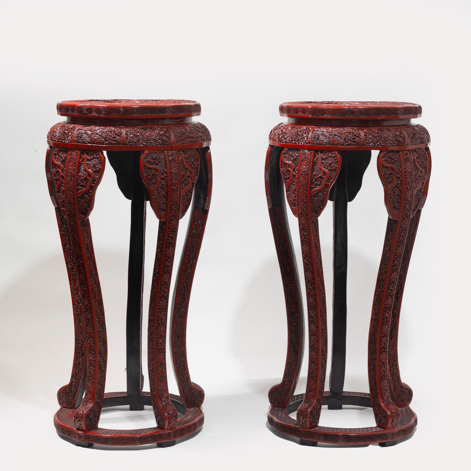 A pair of Chinese Qing Dynasty carved lacquerware tables (1 of 8)