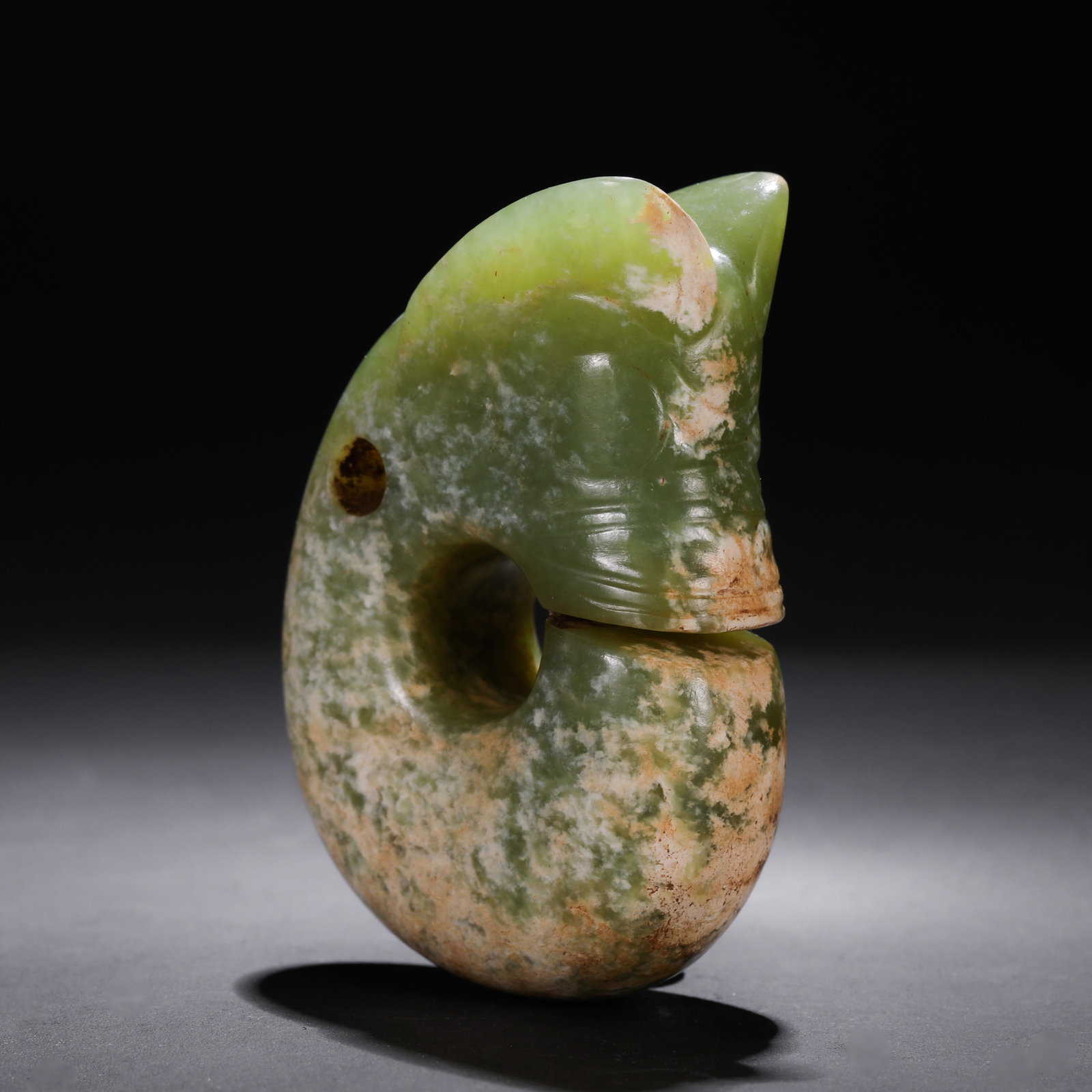 Jade Pig-Dragon from the Hongshan Culture of the Hongshan Period in China: L. 8 cm. W. 5.5 cm. Weight. 190 gram.