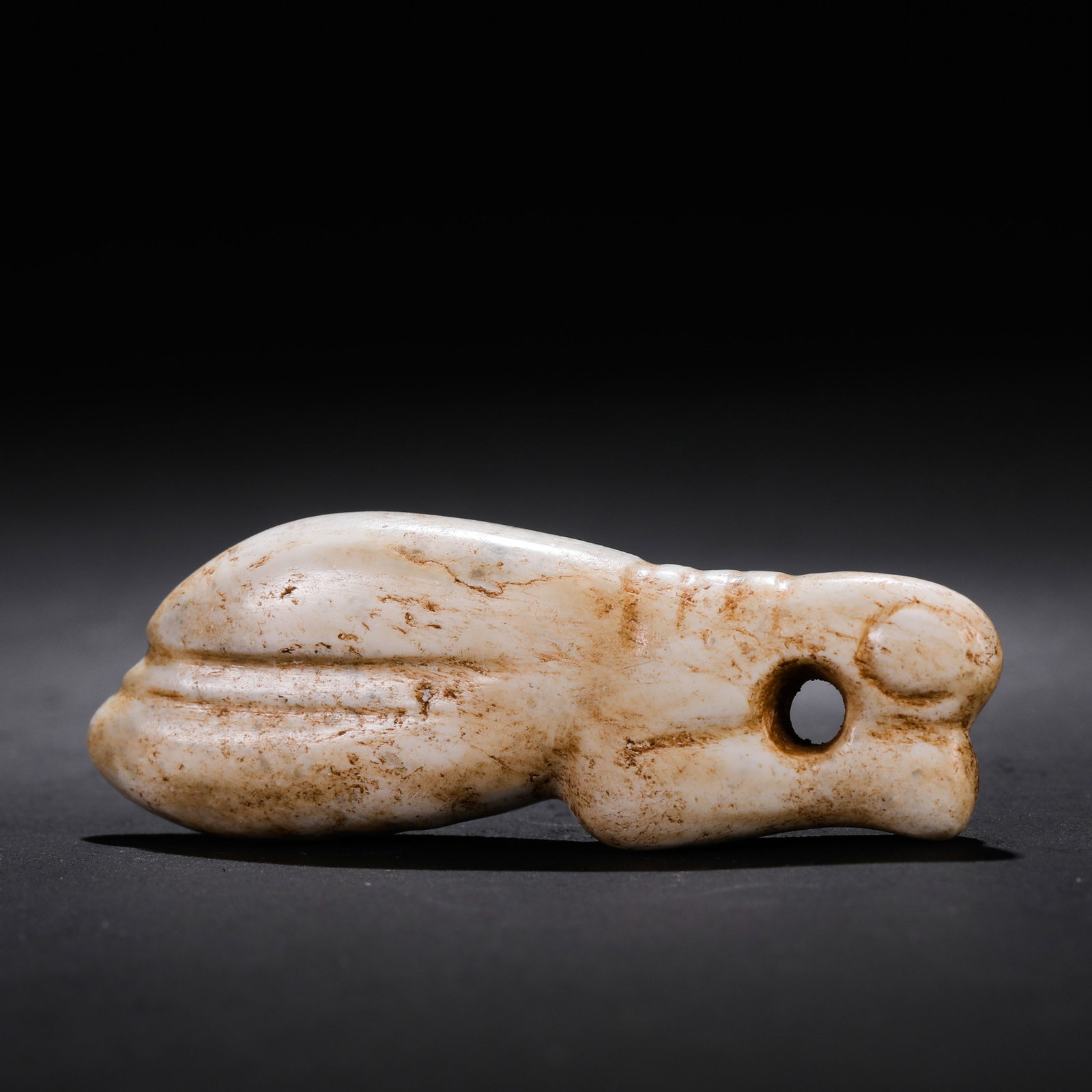 Jade Cicada of the Hongshan Culture during the Hongshan Period in China: L. 6 cm. W. 2.5 cm. Weight. 25 gram.