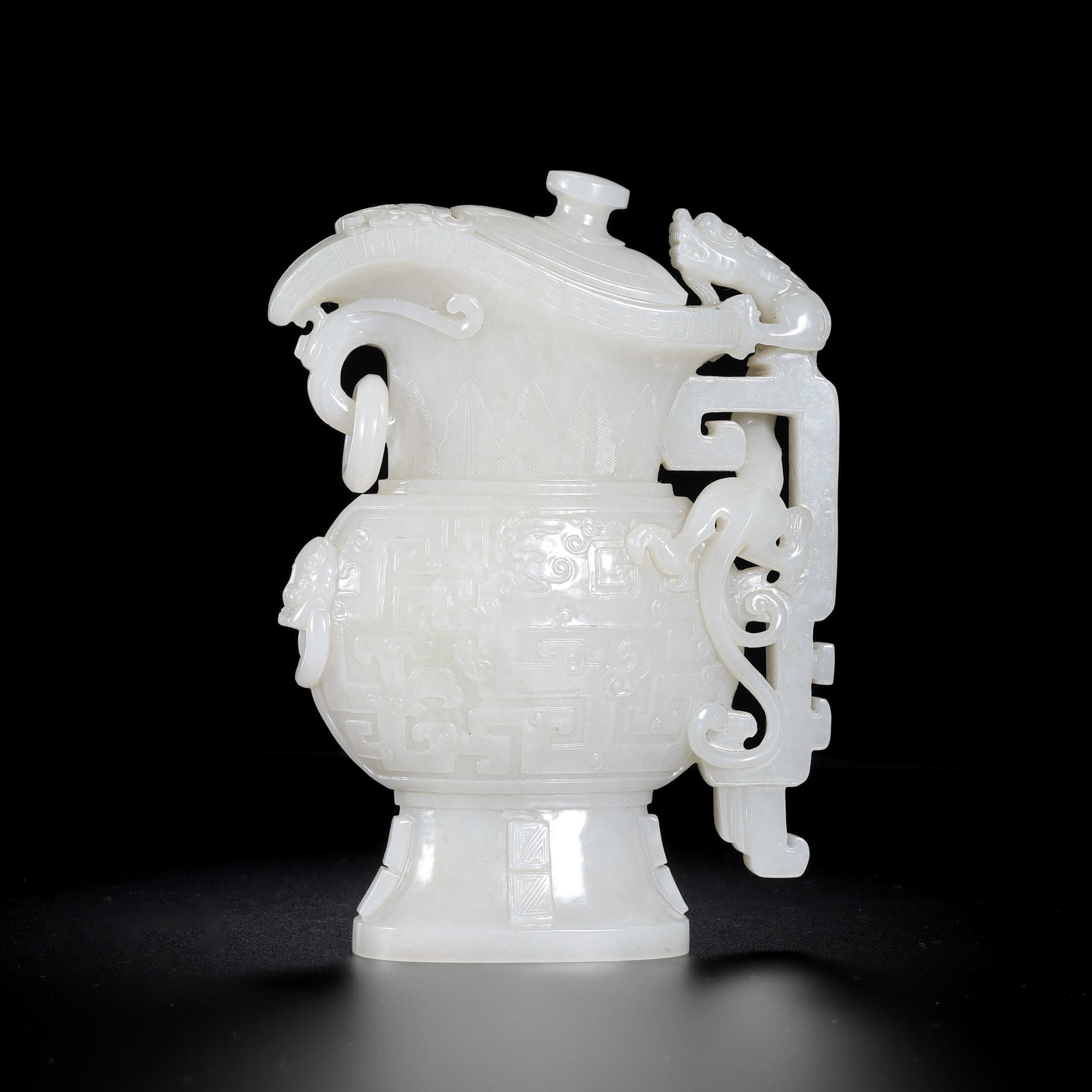 Chinese Qing Dynasty Hetian white jade ring-eared wine cup: H. 16 cm. W. 11.5 cm. Weight. 594.5 gram.