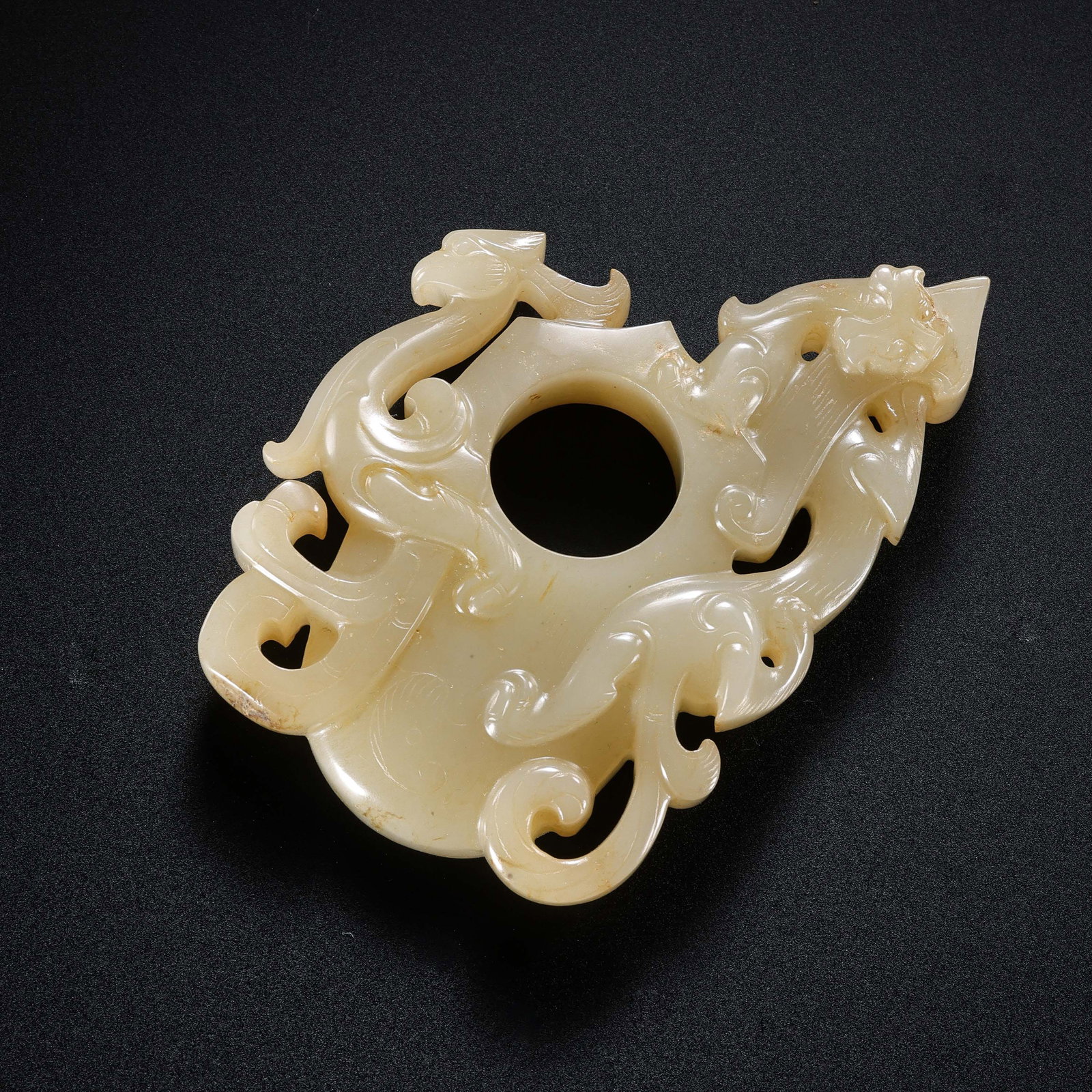 Chinese Han Dynasty Jade Chicken Heart Pendant: L. 8 cm. W. 5 cm. Weight. 66 gram.