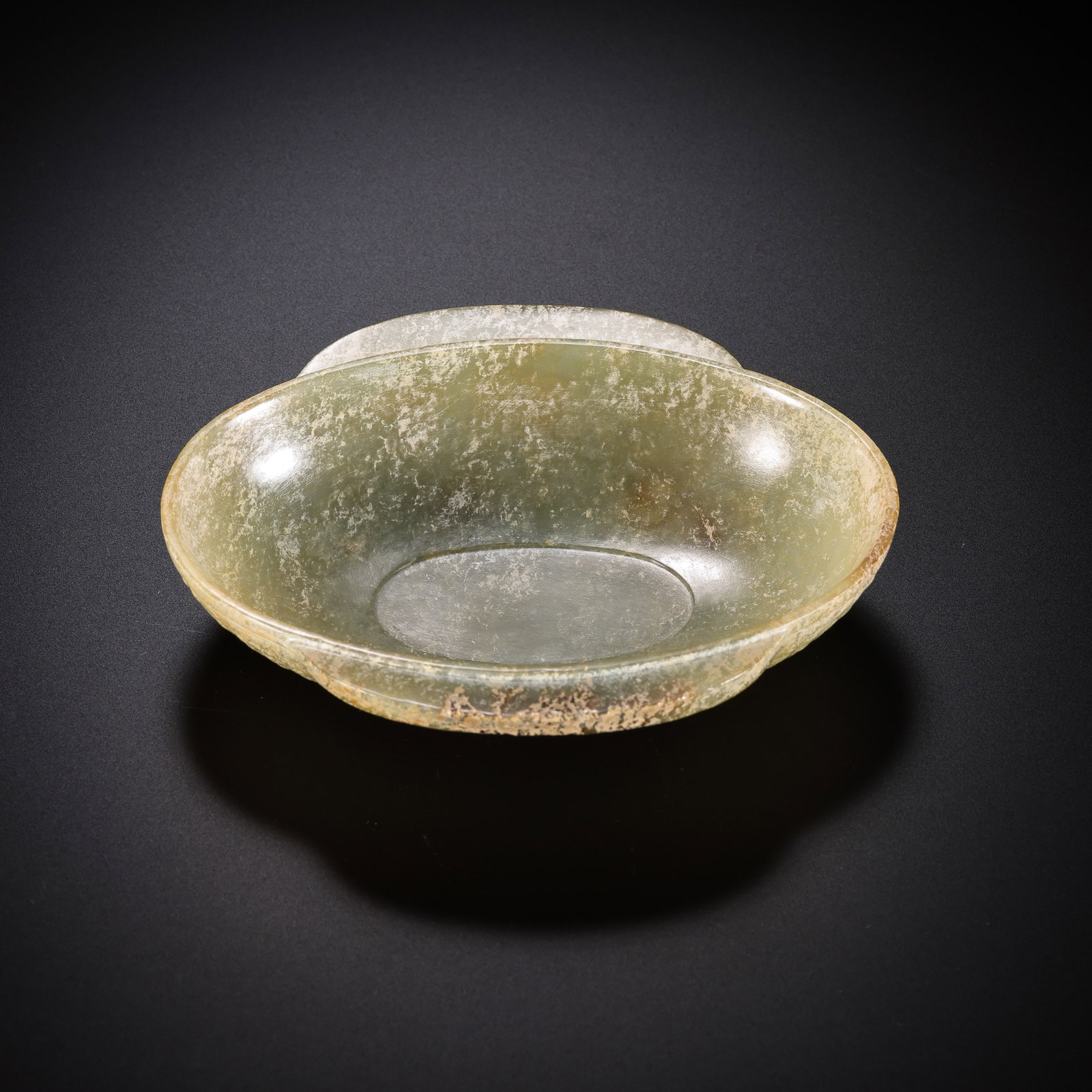 Jade Ear Cup from the Han Dynasty in China: L. 12.2 cm. W. 10.3 cm. H. 2.4 cm. Weight. 132 gram.