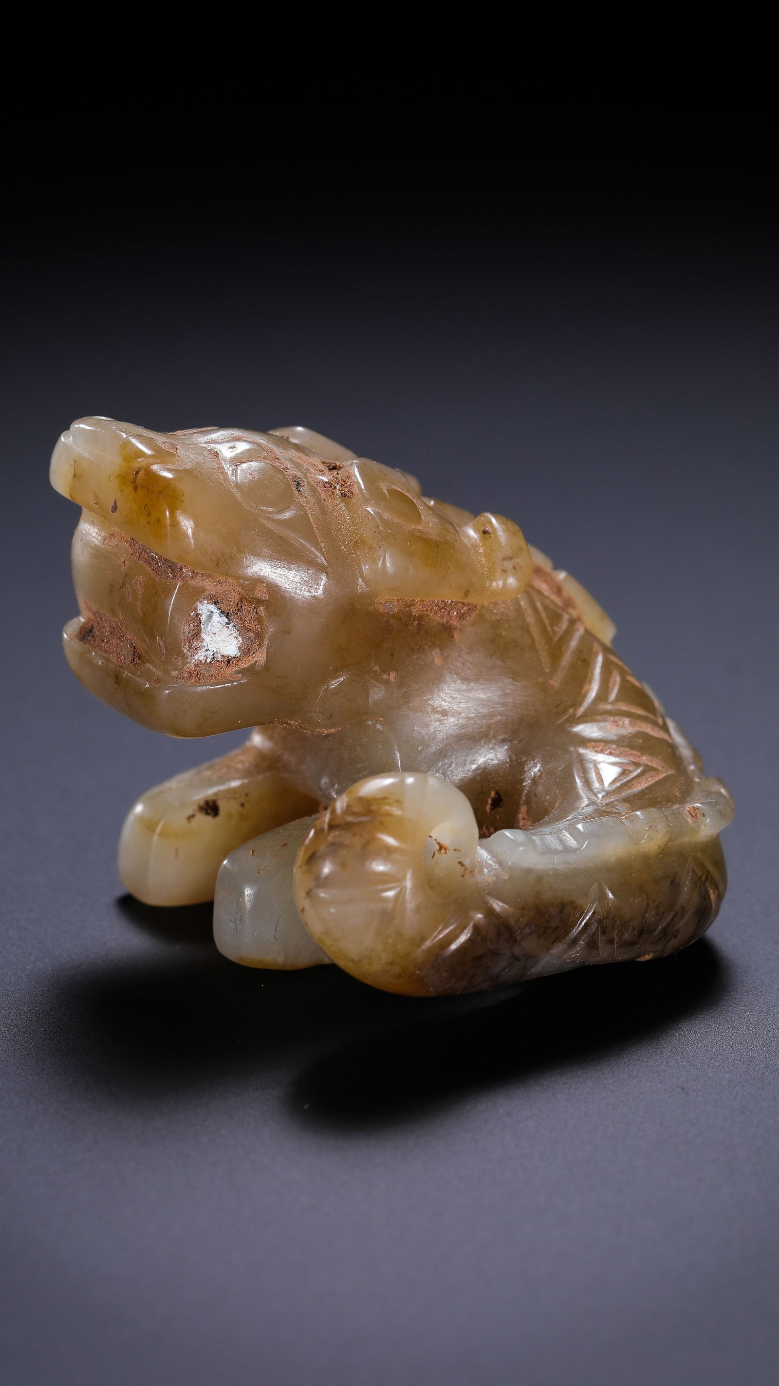 Jade Dragon from the Western Zhou Dynasty in China: H. 3.3 cm. W. 3.5 cm. Weight. 43 gram.