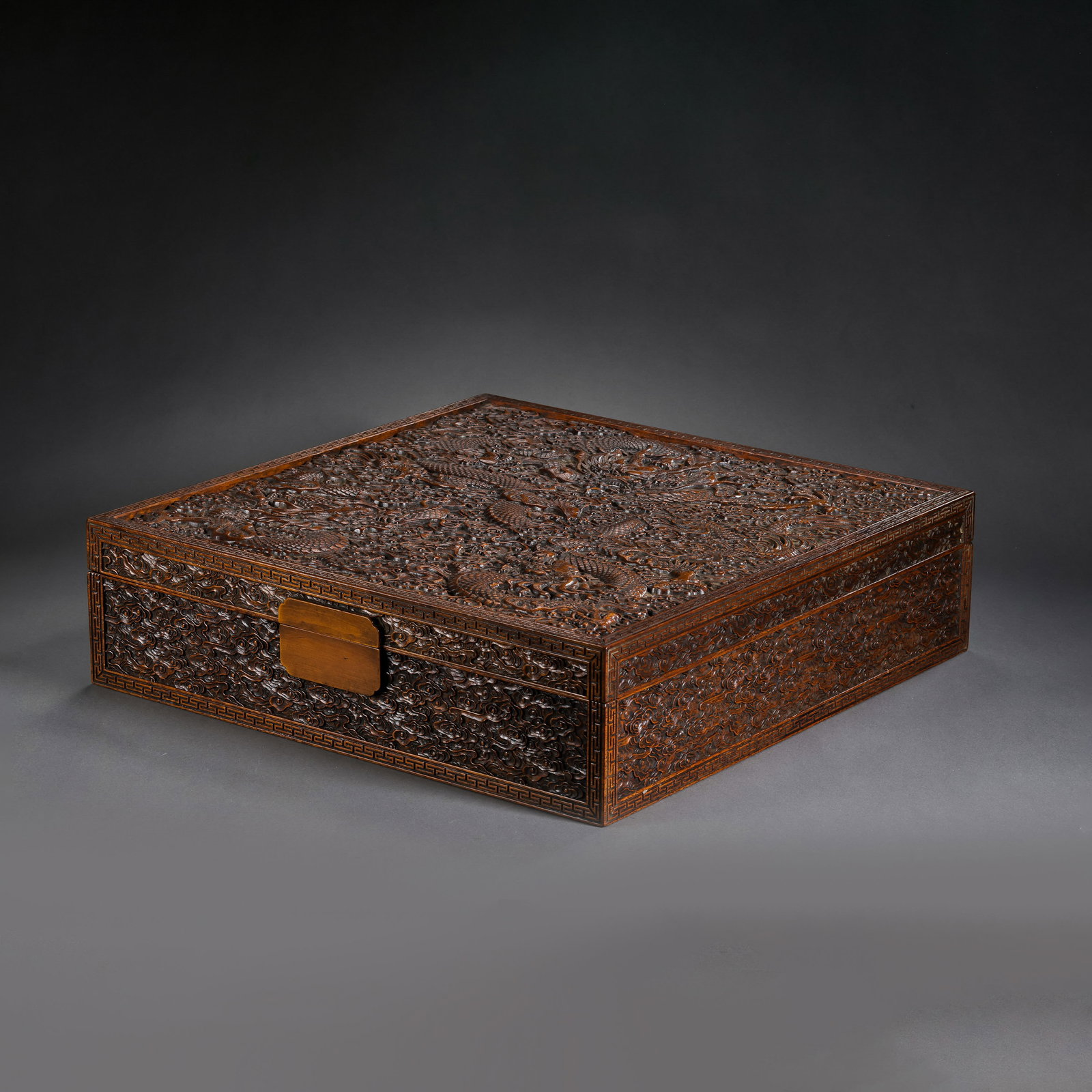 Chinese Qing Dynasty Huanghuali Wood Square Covered Box with Dragon Pattern: L. 36 cm. W. 36 cm. H. 9.5 cm.