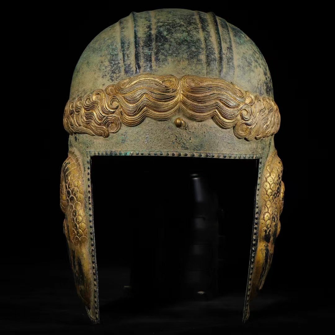 Gilded bronze helmet from ancient Rome: H. 33 cm. W. 23 cm.