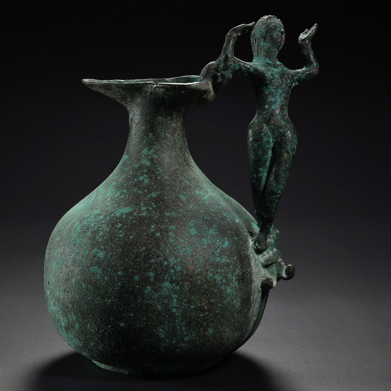 Ancient Roman bronze pot: H. 23 cm. W. 15.3 cm.
