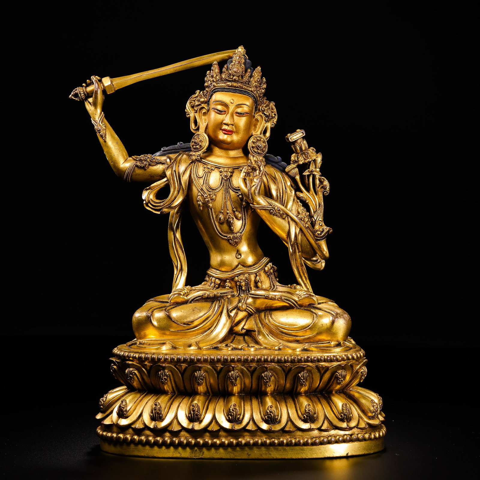 Gilt Bronze Seated Buddha Statue from the Yongle Period of the Ming Dynasty in China: H. 27 cm. W. 19.5 cm. Weight. 3372 gram.