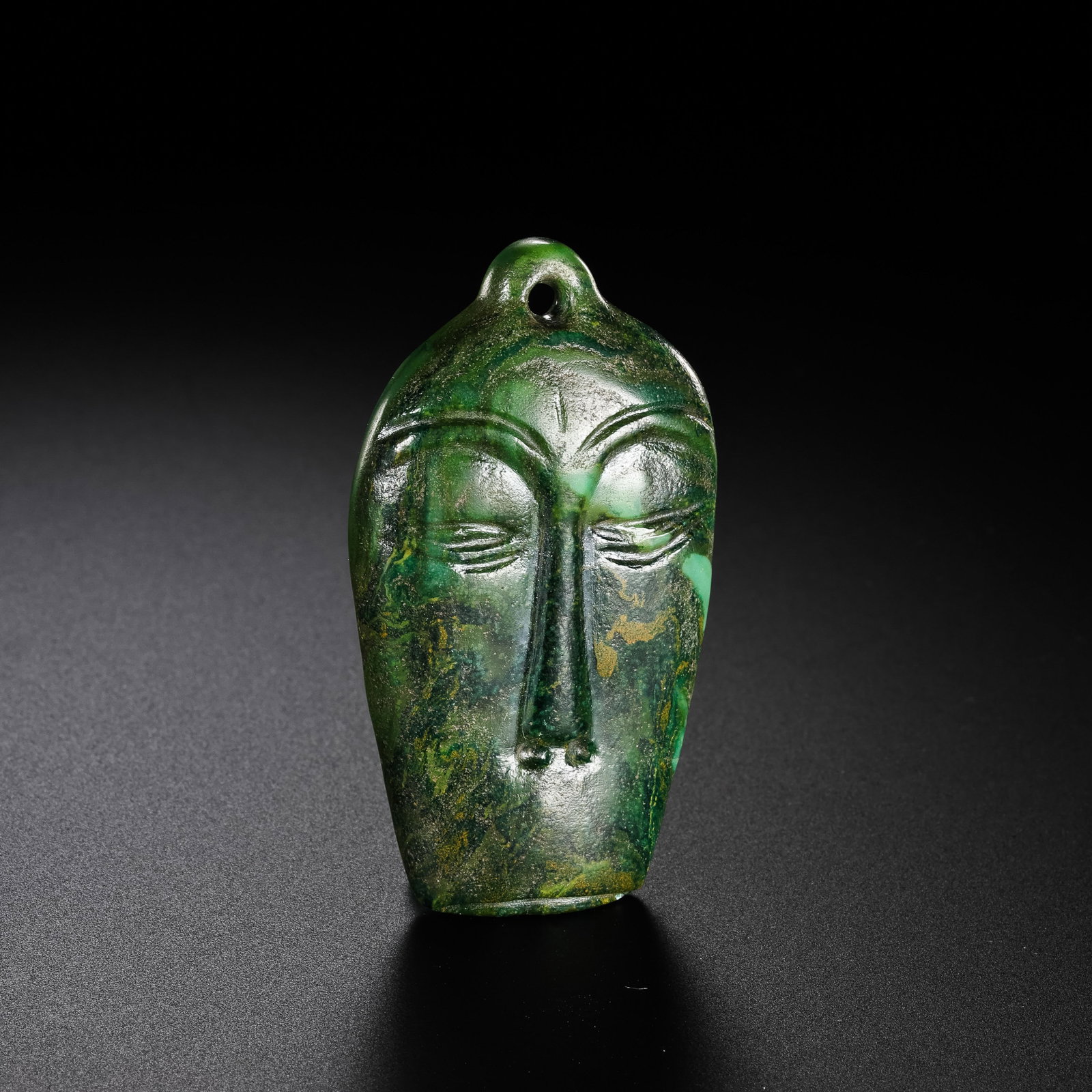 Turquoise human face from the Hongshan Culture of the Hongshan Period in China (1 of 5)
