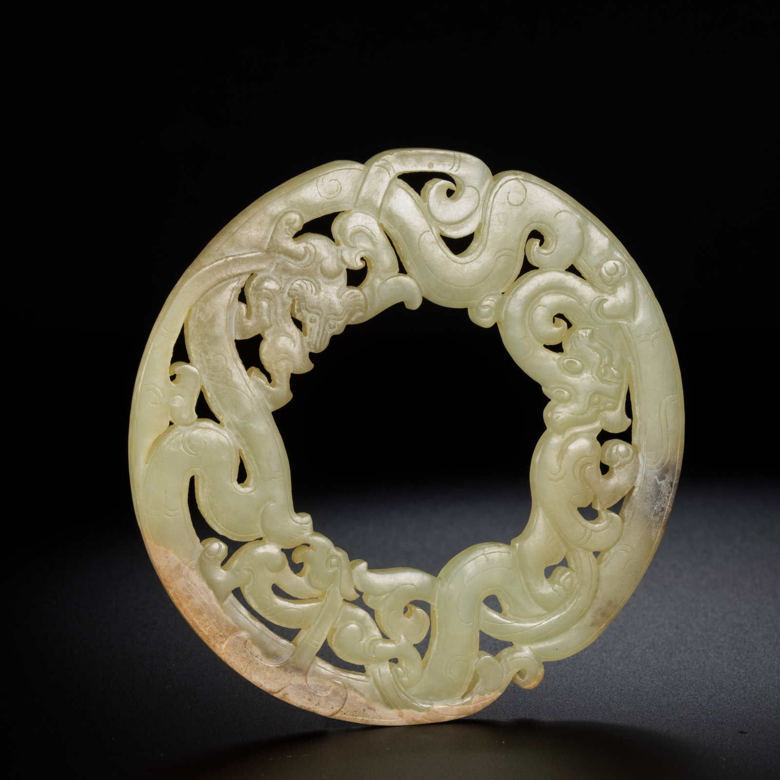 Jade Bi with Chilong Pattern from the Han Dynasty in China: Diam. 8.5 cm.