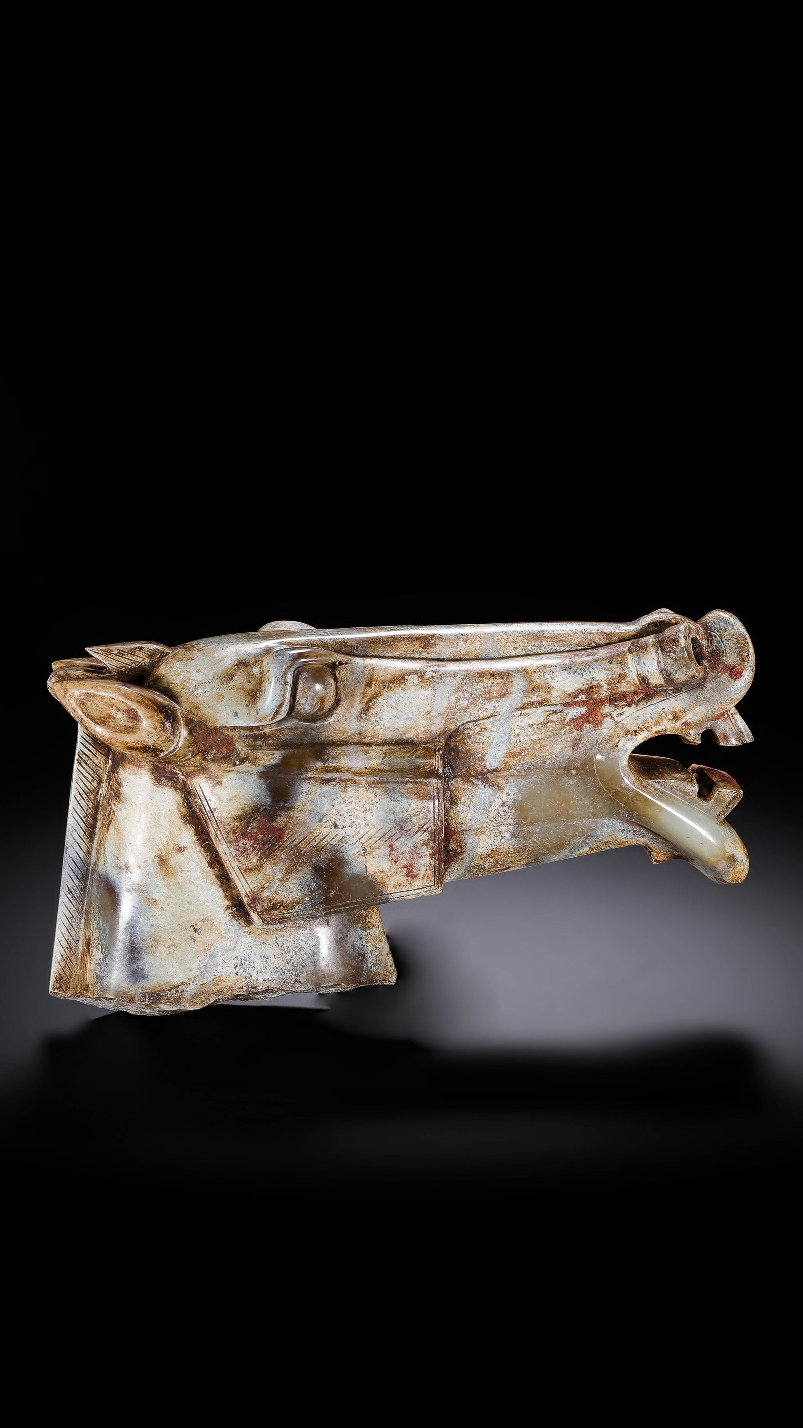 Jade Horse Head from the Han Dynasty in China: H. 12 cm. L. 21 cm.