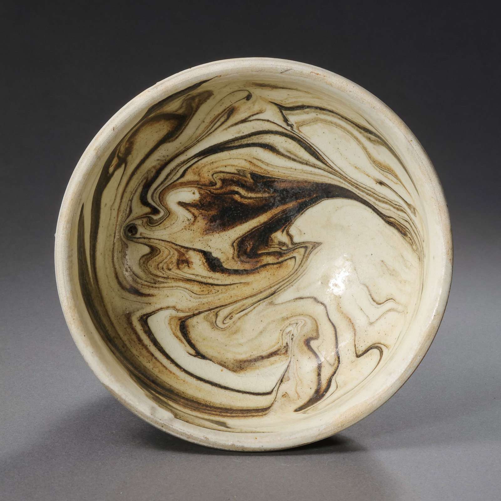 Chinese Song Dynasty unglazed bowl with marbled glaze: Diam. 11.8 cm. H. 5.4 cm.