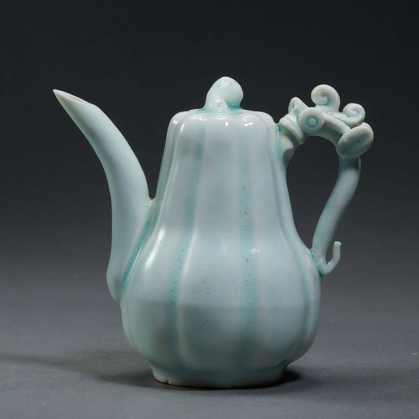 Southern Song Dynasty Chinese Hutian Kiln Shadow-Celadon Glazed Melon-Shaped Ewer: H. 9.5 cm. W. 10 cm.