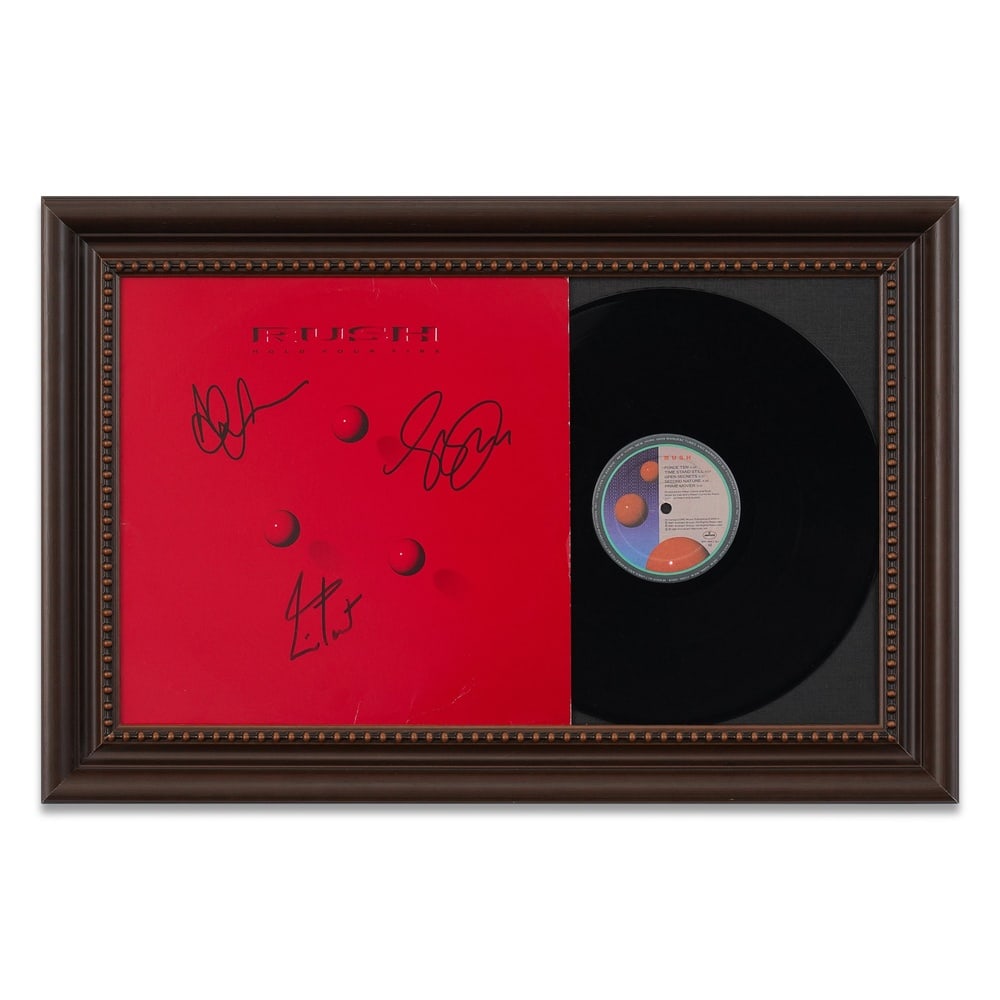 RUSH FULLY SIGNED "HOLD YOUR FIRE" FRAMED LP DISPLAY: Framed Dimensions: 16 3/8 x 24 3/4 in (41.5 x 63 cm) Provenance and Authentication: This collectible has undergone a rigorous forensic evaluation. The signatures were carefully analyzed across