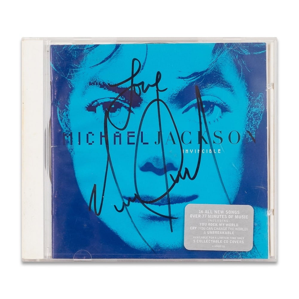 MICHAEL JACKSON SIGNED "INVINCIBLE" CD: 5 5/8 x 4 7/8 in (14.2 x 12.4 cm) Provenance and Authentication: This collectible has undergone a rigorous forensic evaluation. The signatures were carefully analyzed across multiple criteria,