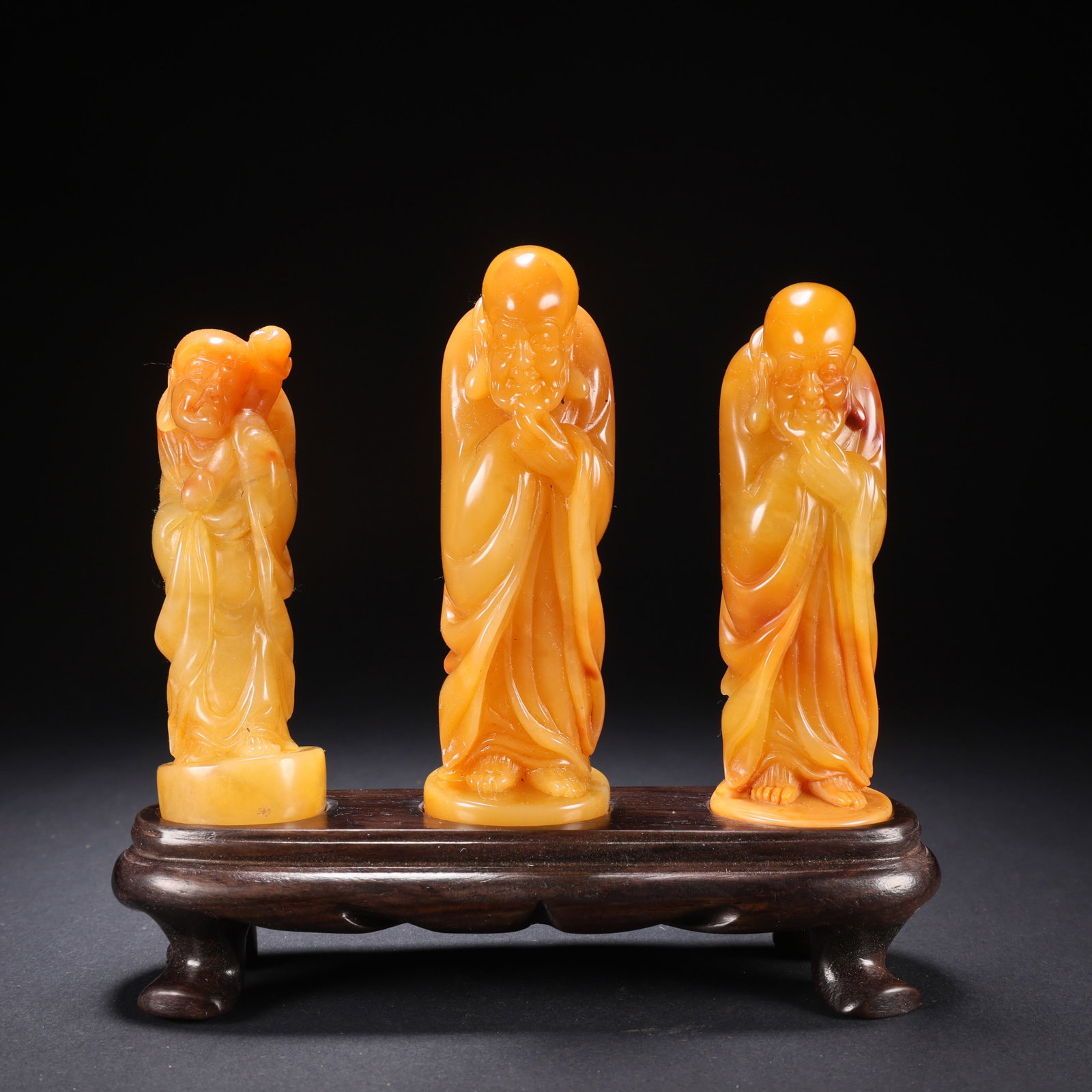 A set of standing figures made of Tianhuang stone from the Qing Dynasty in China: L. 3.3 cm. W. 3.1 cm. H. 10.2 cm. Weight. 333 gram.