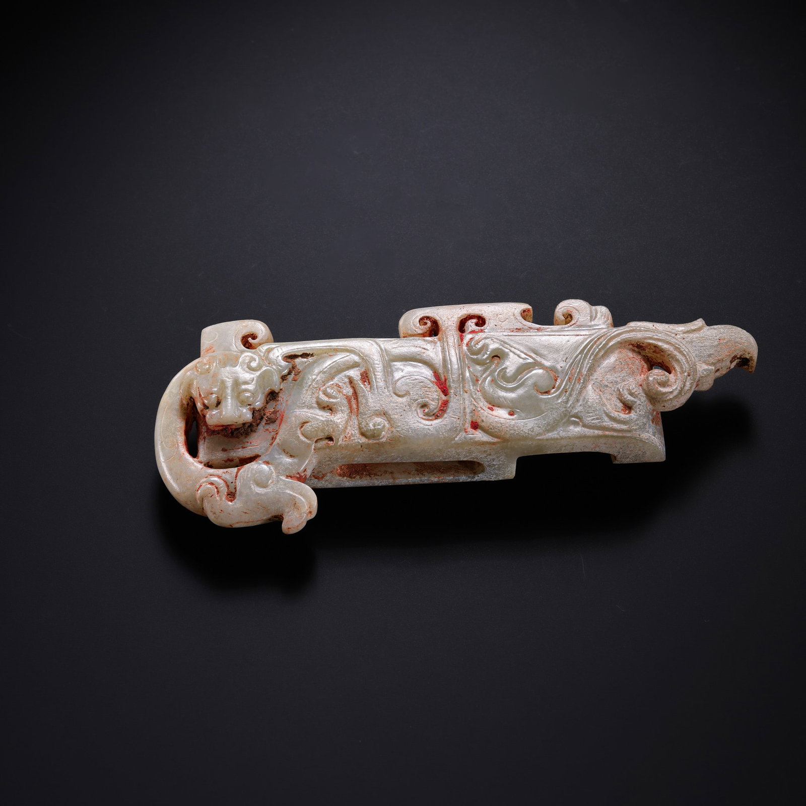 Jade sword ornaments from the Han Dynasty in China: L. 10.6 cm. W. 4 cm. Weight. 64 gram.