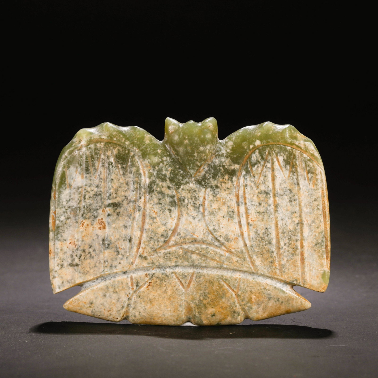 Jade Owl of the Hongshan Culture during the Hongshan Period in China: H. 6.5 cm. W. 9 cm. Weight. 90 gram.