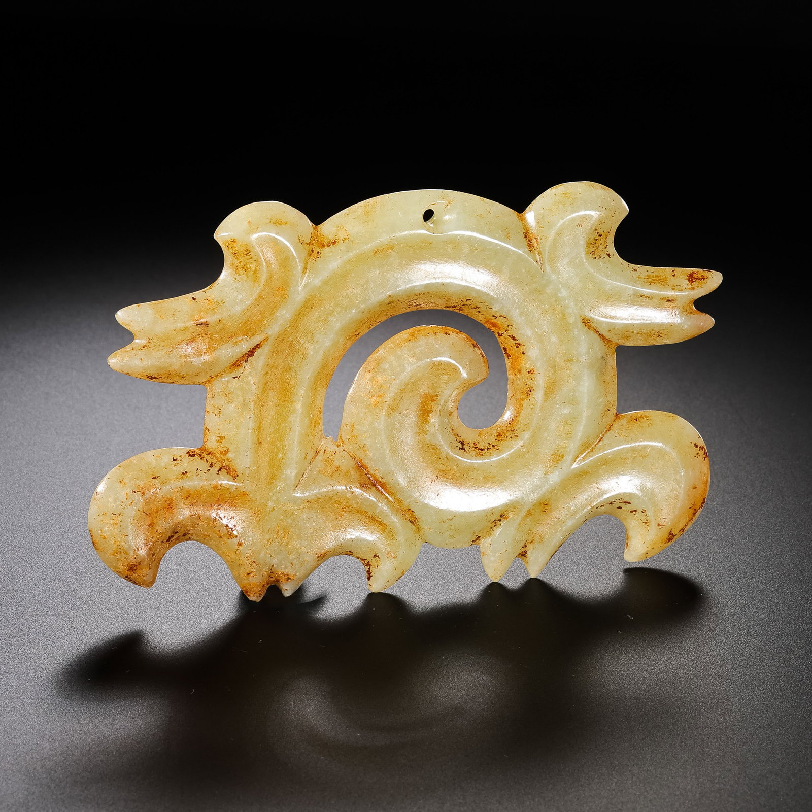 Hongshan Culture (Hongshan Period) Jade Pendant with Hooked Clouds: L. 11.3 cm. W. 7 cm. Weight. 89 gram.