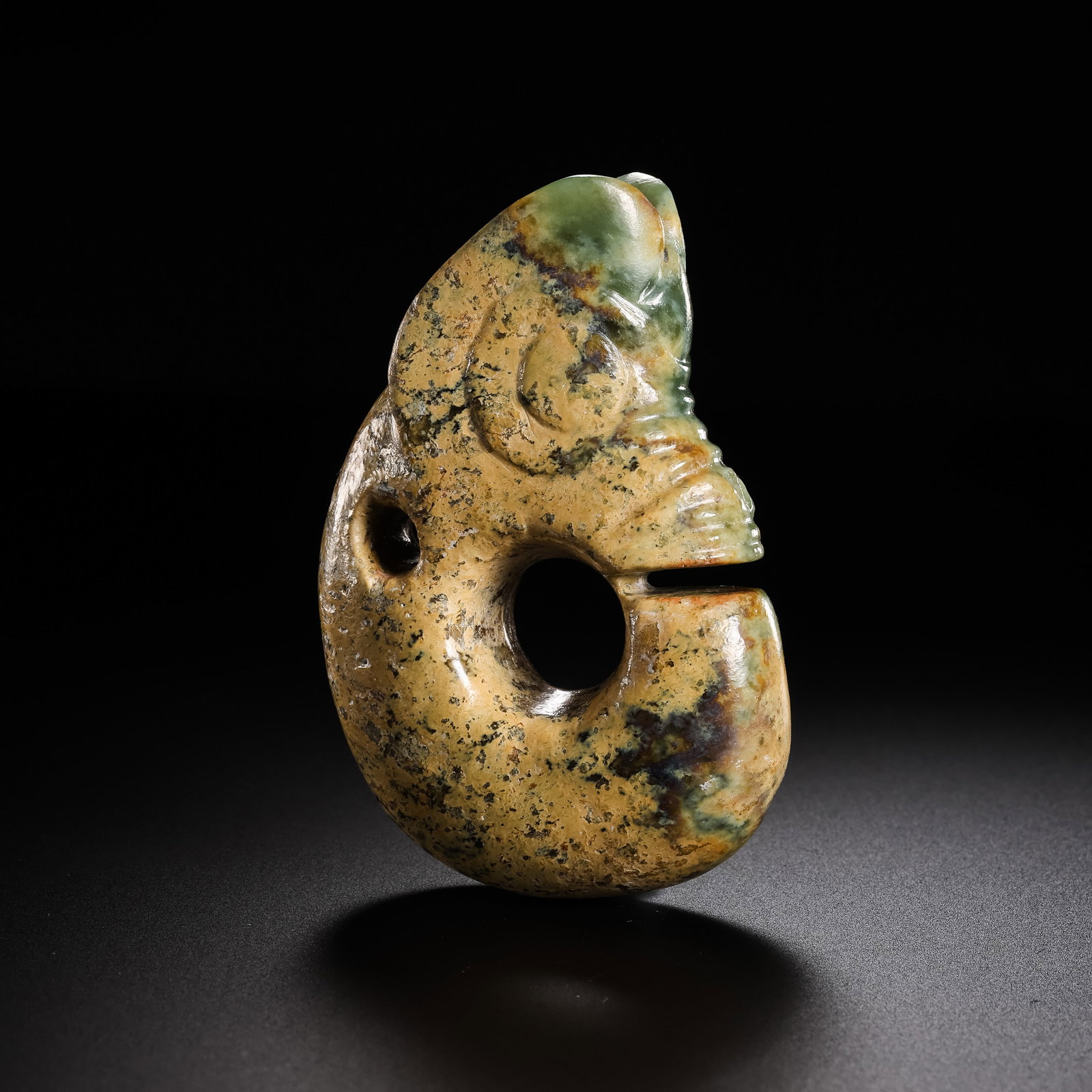 Jade Pig-Dragon from the Hongshan Culture of the Hongshan Period in China: H. 7 cm. W. 4.5 cm. Weight. 90 gram.