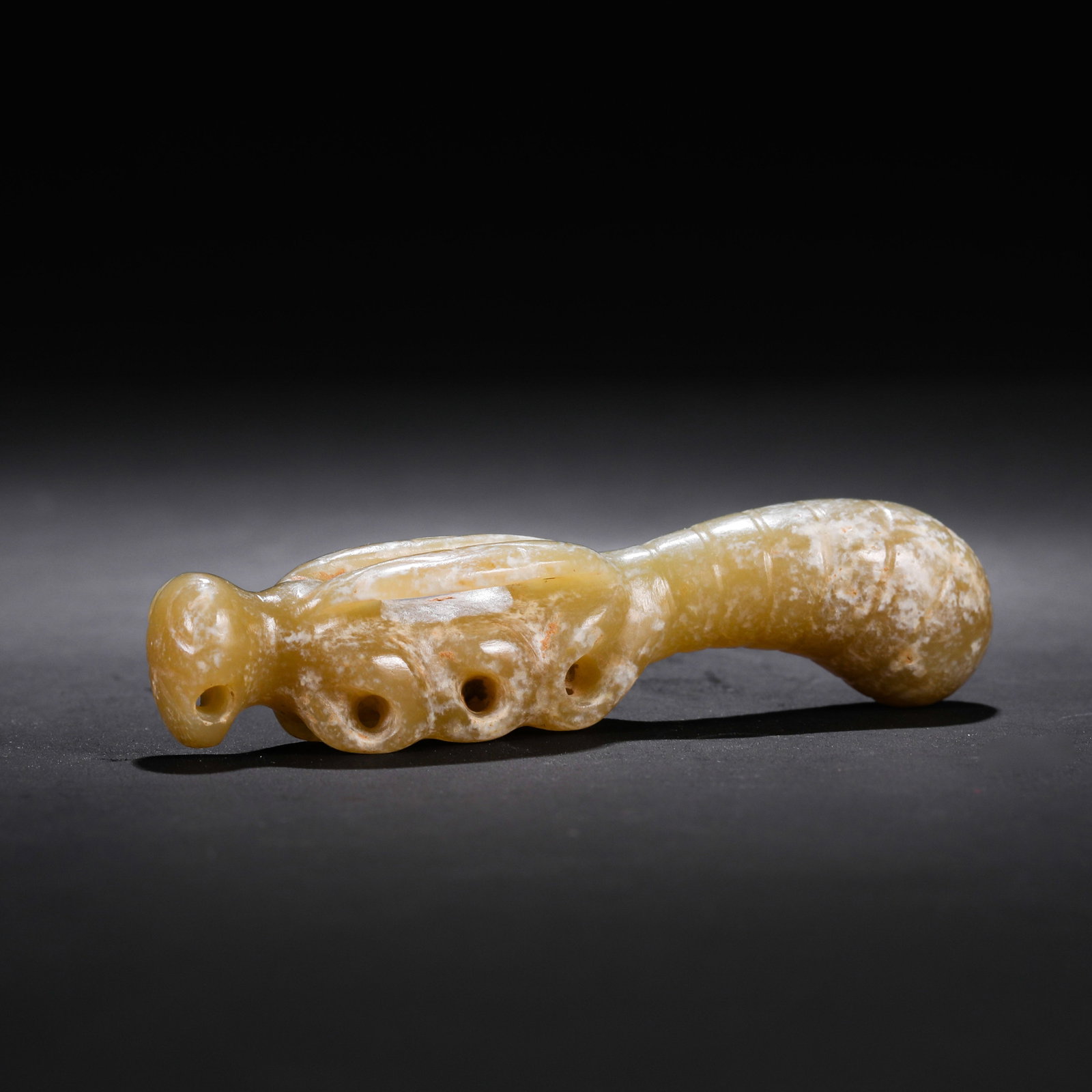 Jade artifacts from the Hongshan Culture period in China: L. 8 cm. W. 2 cm. Weight. 30 gram.