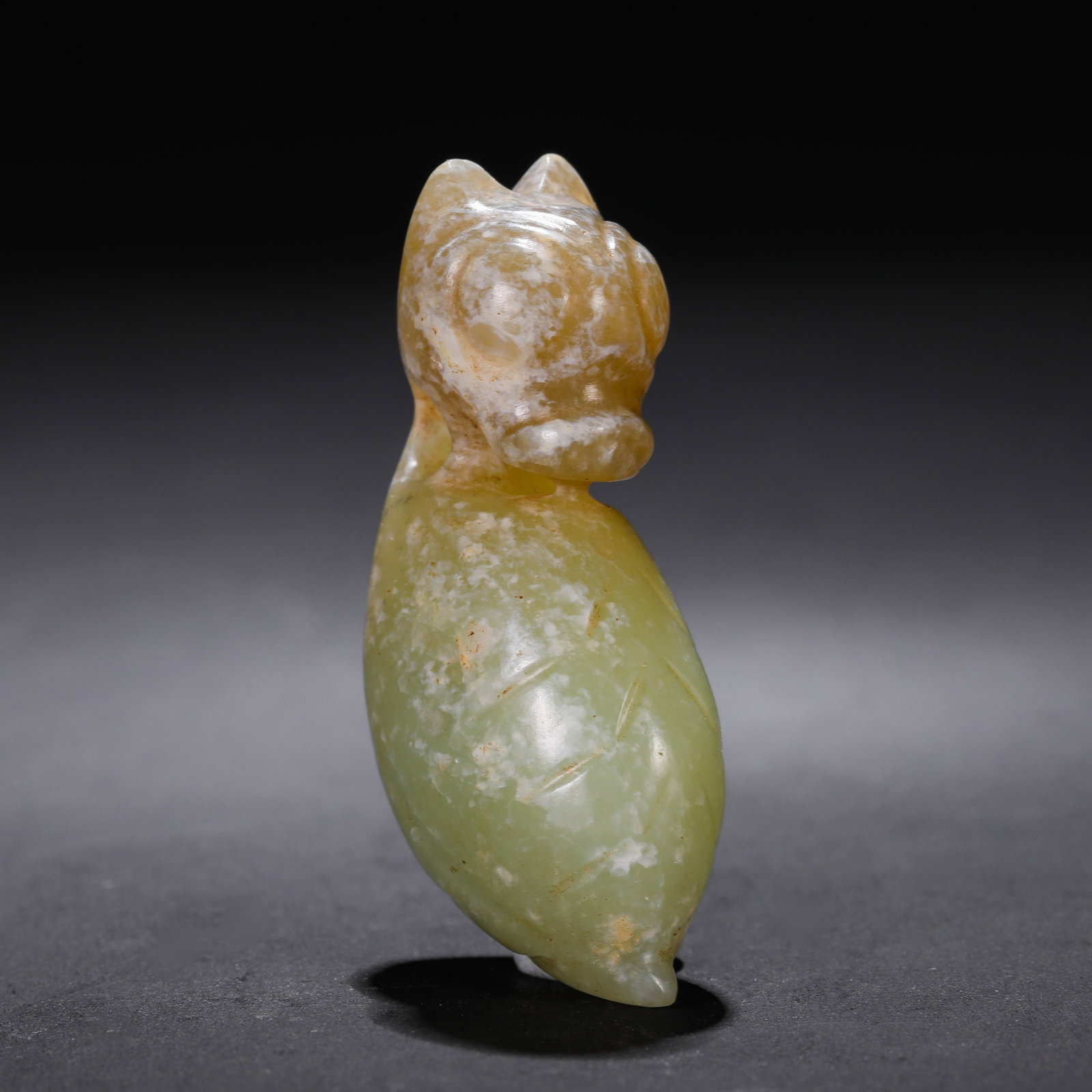 Jade Dragon Treasure from the Hongshan Culture of the Hongshan Period in China: L. 5 cm. W. 2.5 cm. Weight. 22 gram.