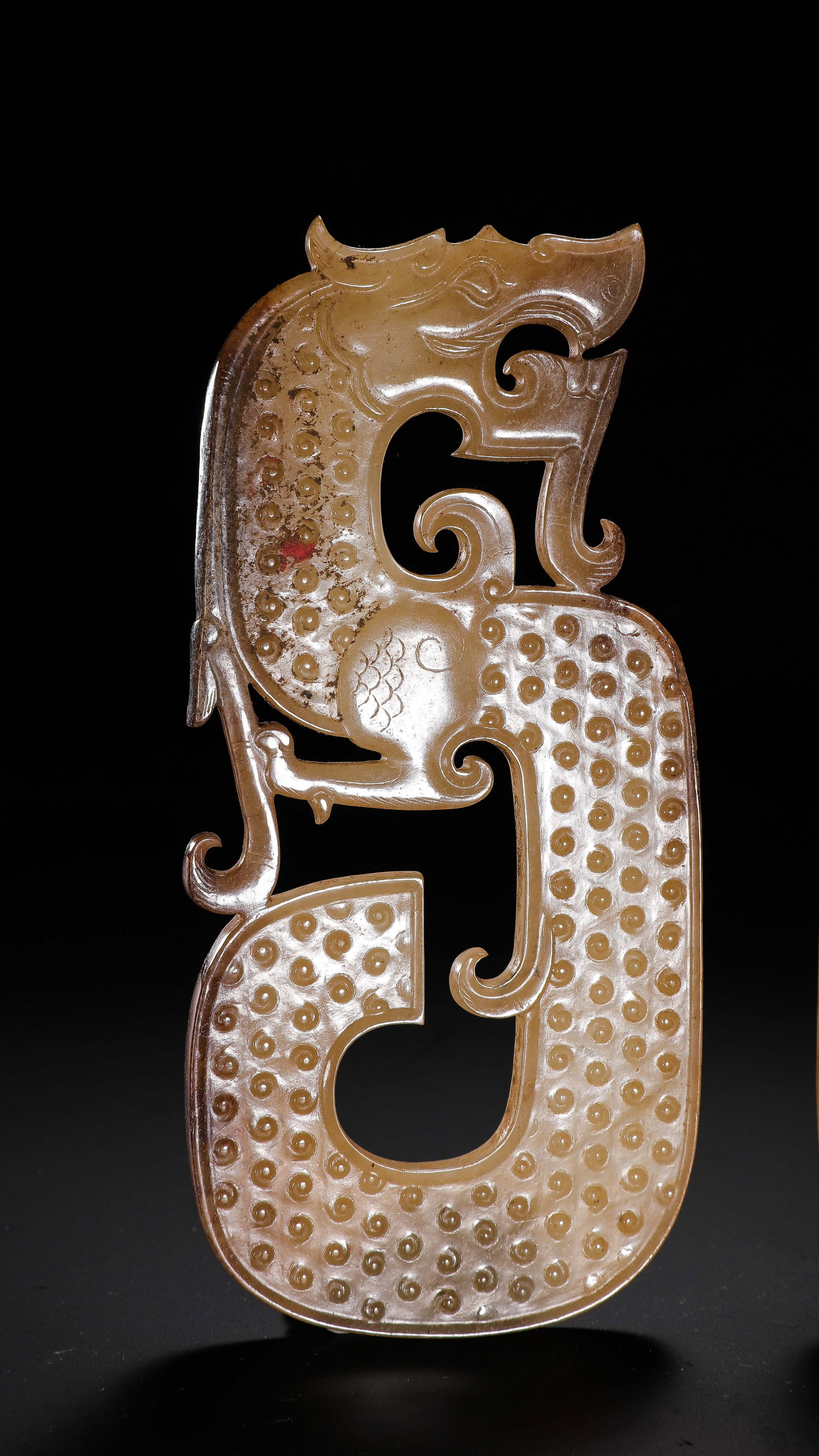 A pair of Chinese Han Dynasty jade dragon pendants: L. 13.1 cm. W. 6.9 cm. Weight. 148 gram.