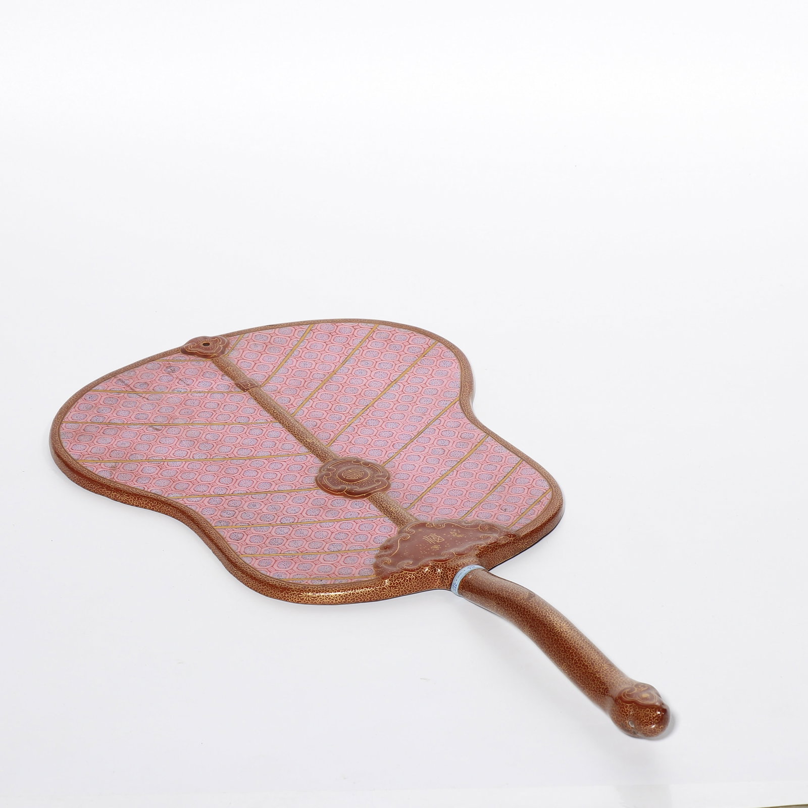 Palm leaf fan from the Yongzheng period of the Qing Dynasty in China: L. 43.3 cm. W. 22 cm.