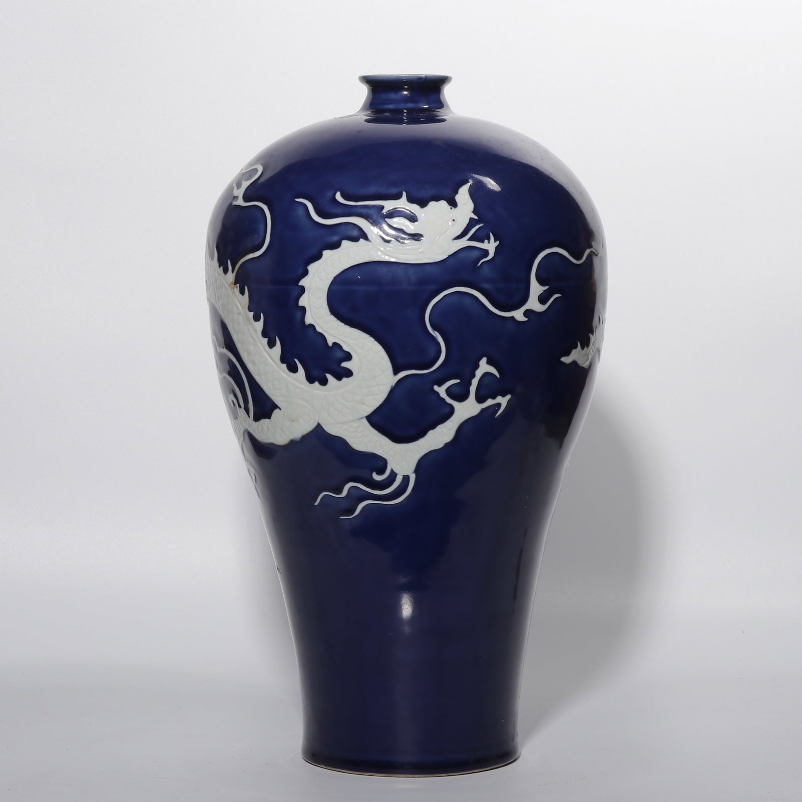 Chinese Yuan Dynasty blue-glazed plum vase with white dragon design (1 of 6)