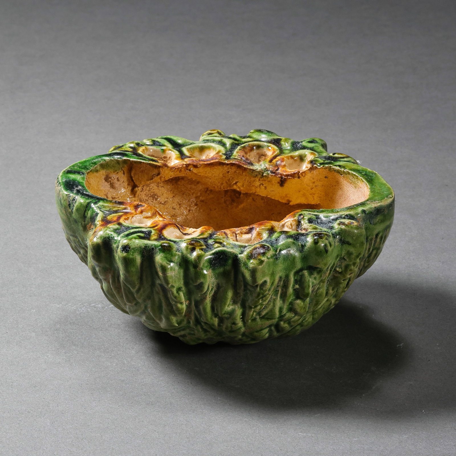Chinese Tang Dynasty Green Glazed Hand Cup: H. 3.6 cm. L. 8.2 cm.