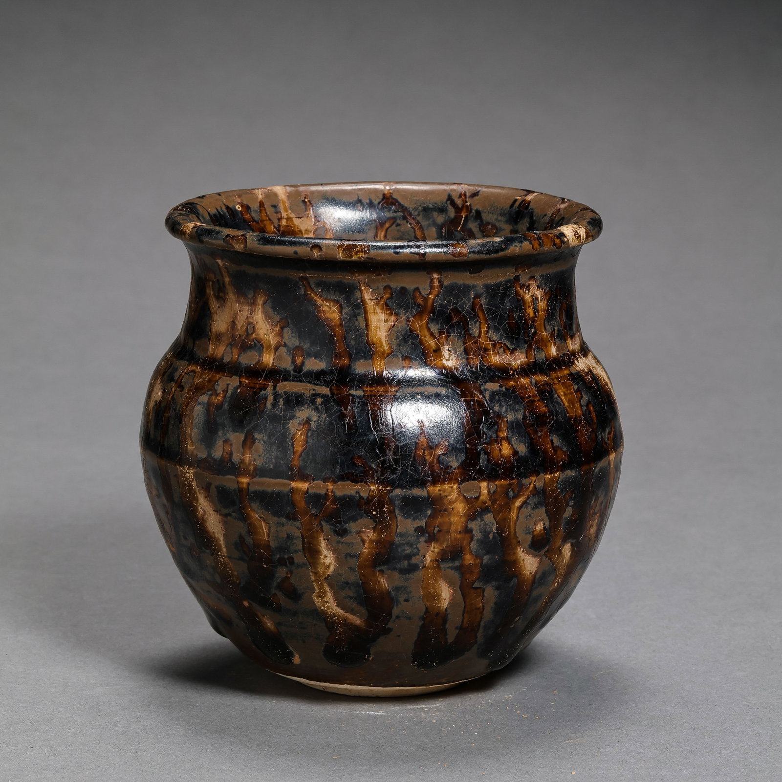 Tortoiseshell-glazed jar with constricted mouth from the Jizhou kiln of the Southern Song Dynasty,: H. 9.7 cm. Diam. 8.5 cm.
