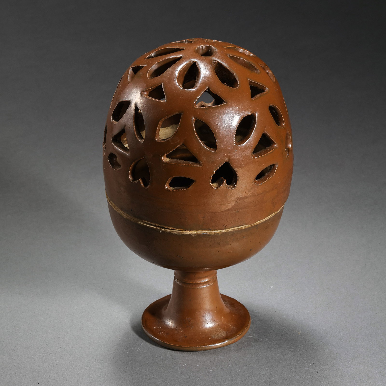 Red-glazed incense burner from the Yaozhou kiln of the Northern Song Dynasty, China: H. 14.5 cm.