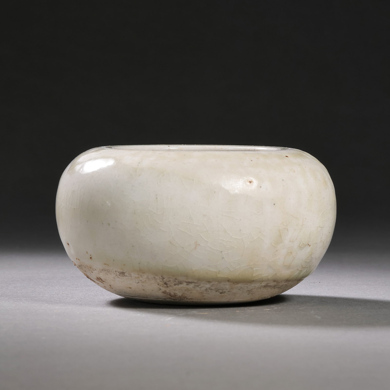 White porcelain water dropper from Gongxian kiln, Tang Dynasty, China: H. 4.5 cm. W. 8.8 cm.