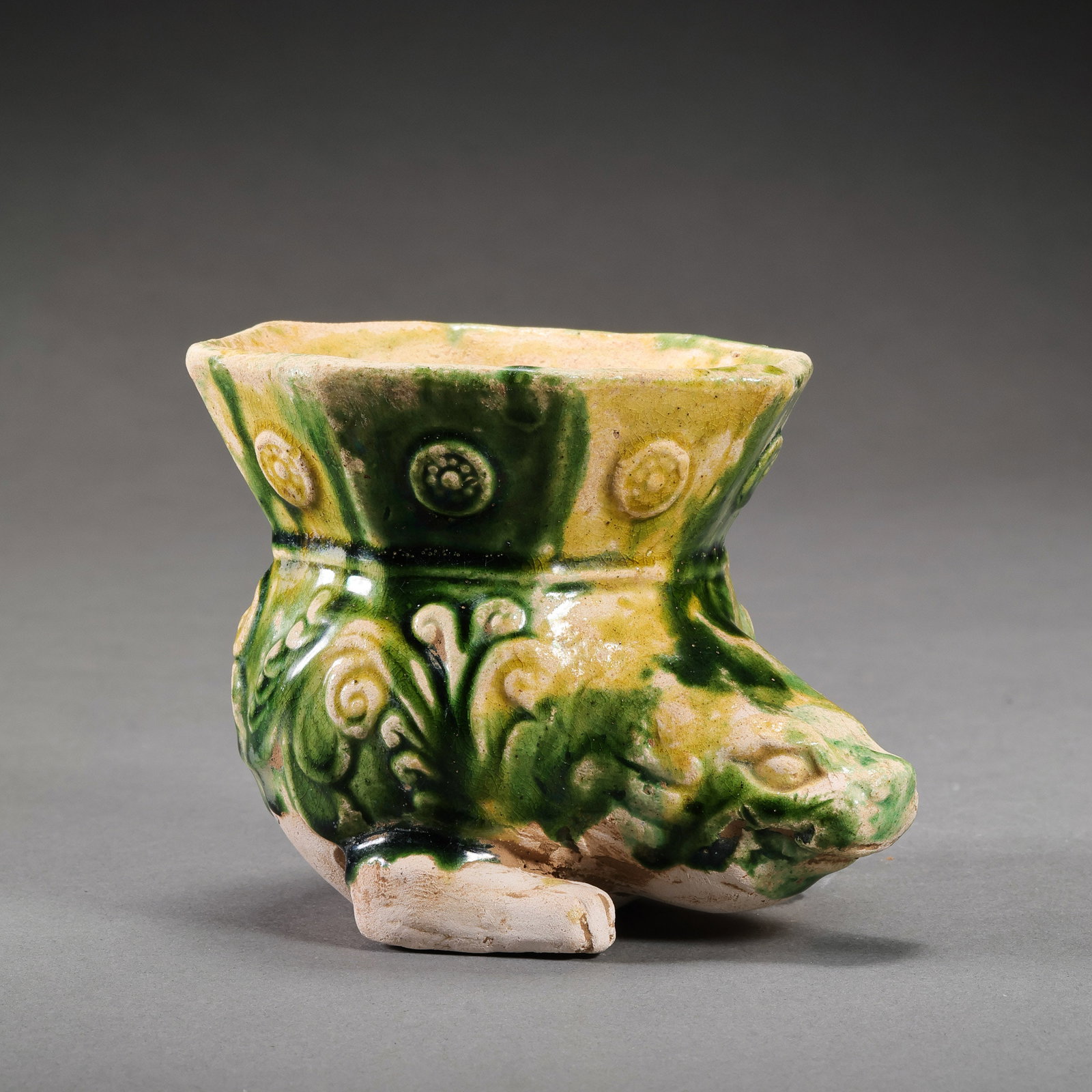 Chinese Tang Dynasty Tricolor Glazed Auspicious Beast Cup: H. 7.8 cm. L. 10.5 cm.