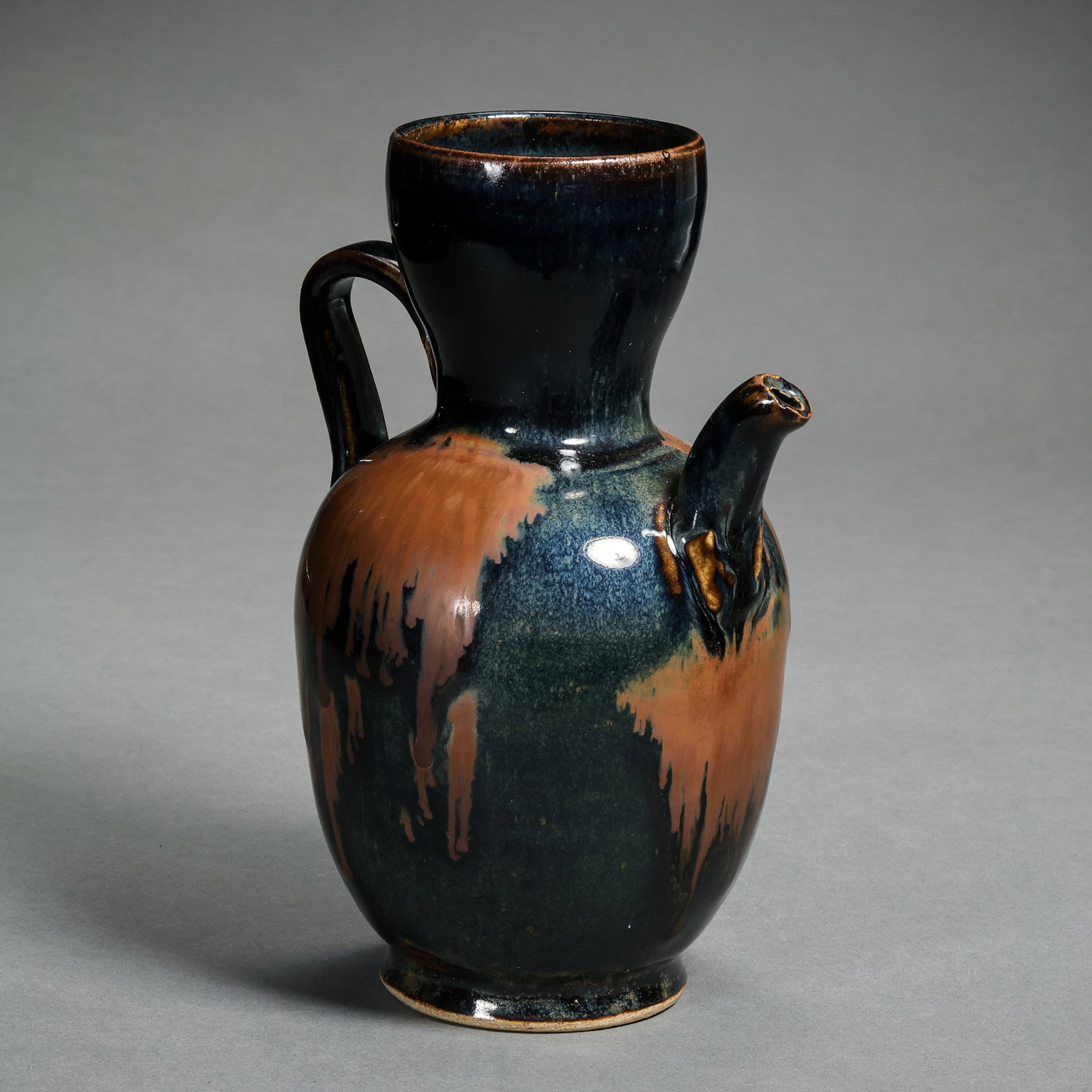 Iron-embroidered ewer from Cizhou ware, Northern Song Dynasty, China: H. 17.7 cm. W. 12.5 cm.