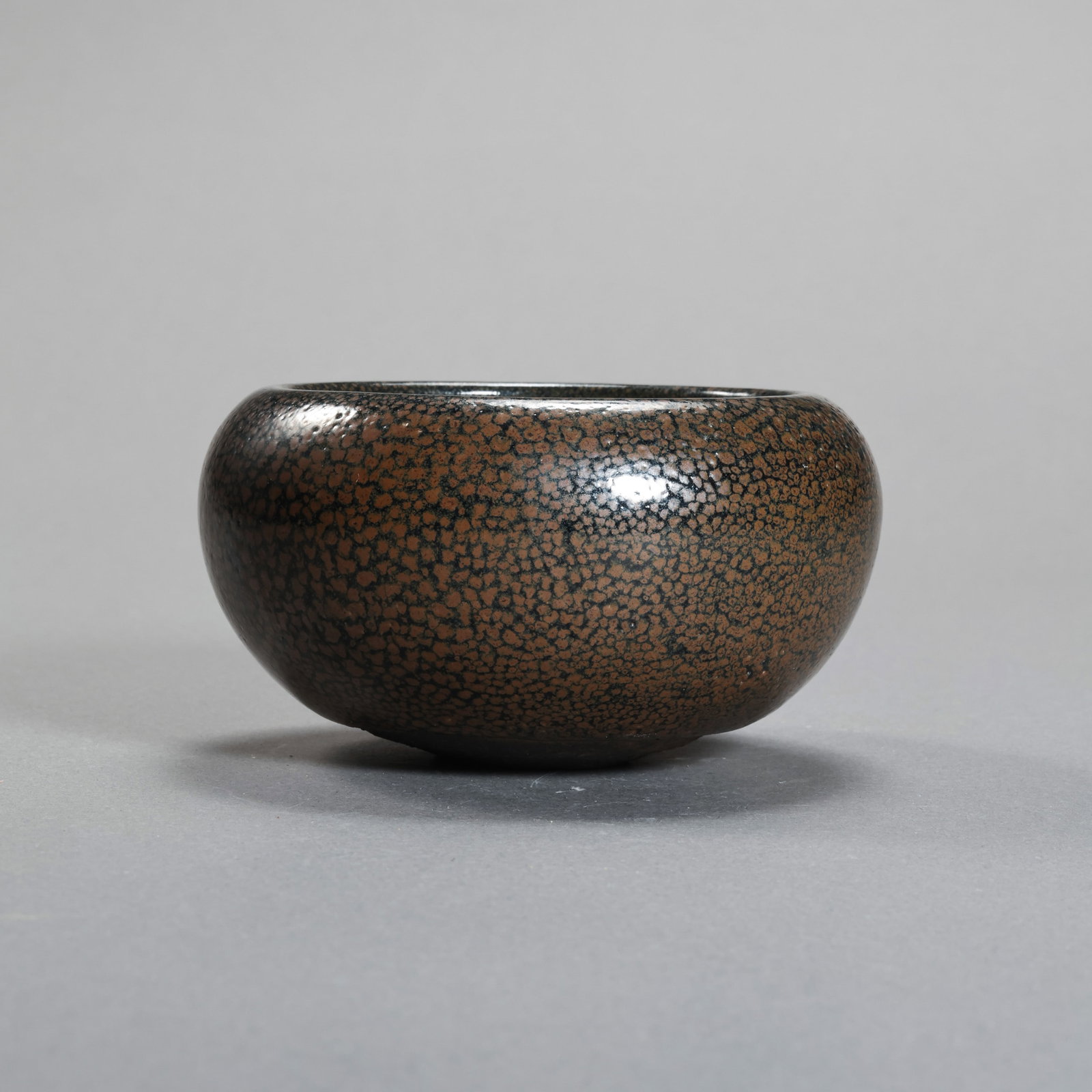A Cizhou ware water dropper with iron rust spots from the Northern Song Dynasty, China: H. 4.9 cm. Diam. 8.9 cm.
