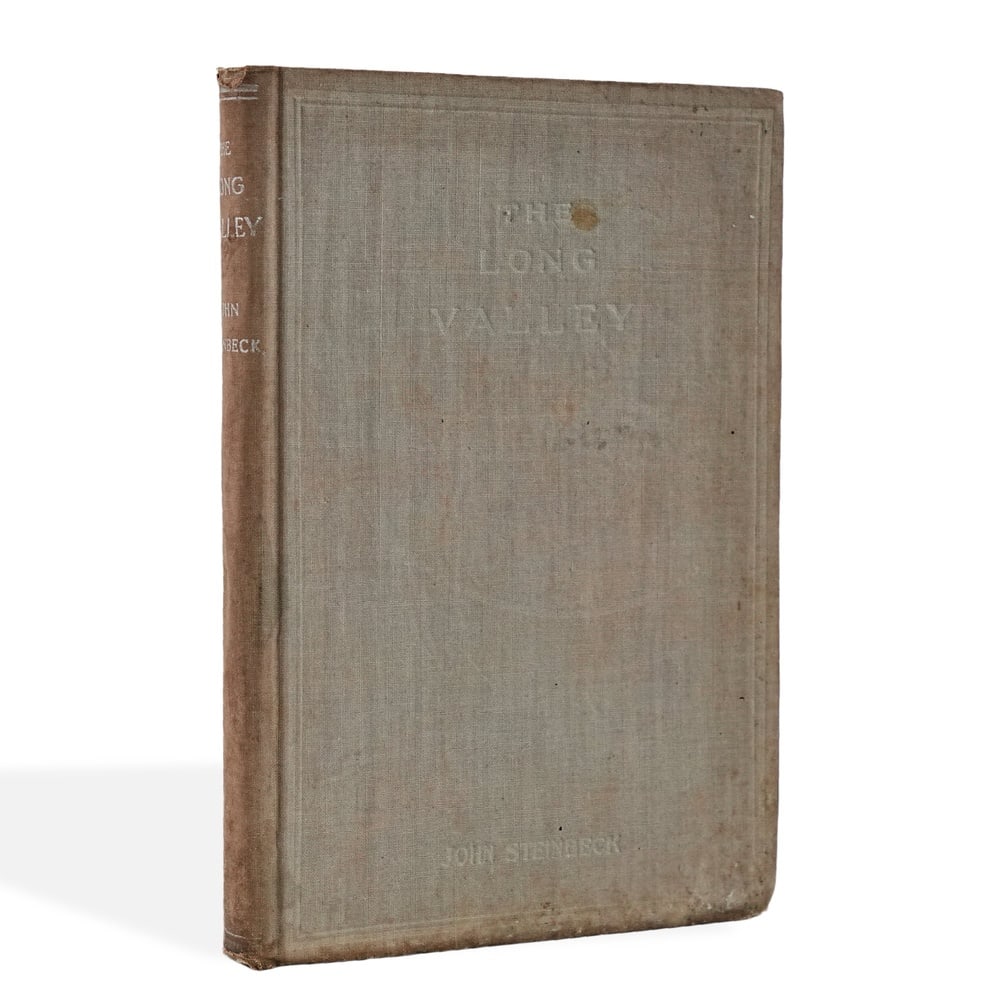 JOHN STEINBECK SIGNED "THE LONG VALLEY" FIRST EDITION: 7 7/8 x 5 1/4 in (20.1 x 13.4 cm) Provenance and Authentication: According to the Letter of Authenticity (LOA) and Certificate of Authenticity (COA) provided by the consignor, this collectible was
