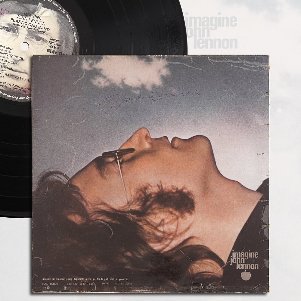 JOHN LENNON SIGNED "IMAGINE" LP: 12 1/4 x 12 1/4 in Provenance and Authentication: According to the Letter of Authenticity (LOA) and Certificate of Authenticity (COA) provided by the consignor, this collectible was subjected to a for