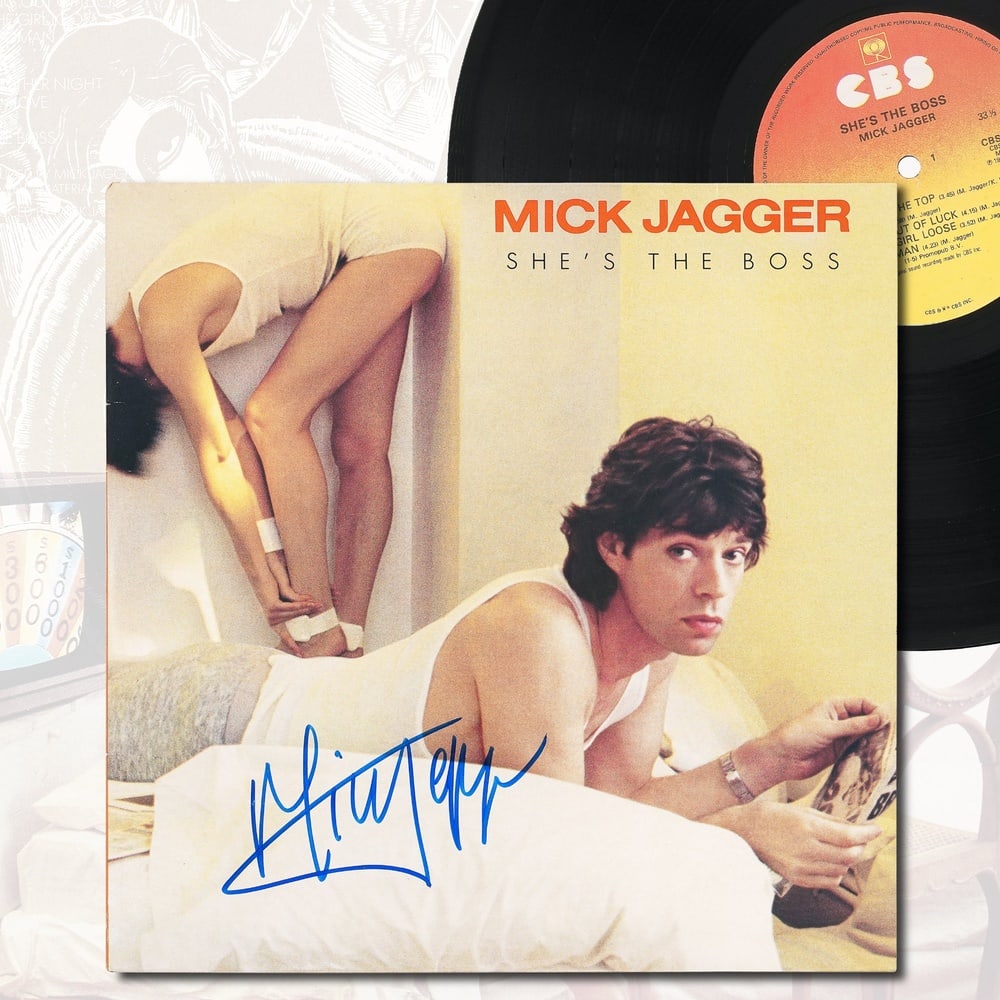 MICK JAGGER SIGNED "SHE'S THE BOSS" LP: 12 1/4 x 12 1/4 in Provenance and Authentication: According to the Letter of Authenticity (LOA) and Certificate of Authenticity (COA) provided by the consignor, this collectible was subjected to a