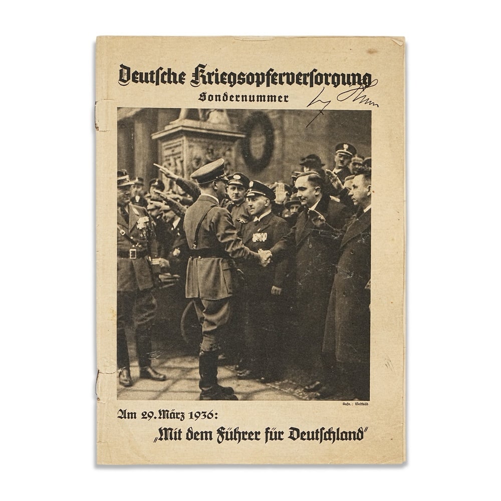 ADOLF HITLER SIGNED DEUTSCHE KRIEGSOPFERVERSORGUNG SPECIAL ISSUE: 10 1/8 x 7 1/4 in (25.6 x 18.5 cm) A 1936 special issue of Deutsche Kriegsopferversorgung, the official publication associated with the German War Victims' Welfare Organization. The cover features a c