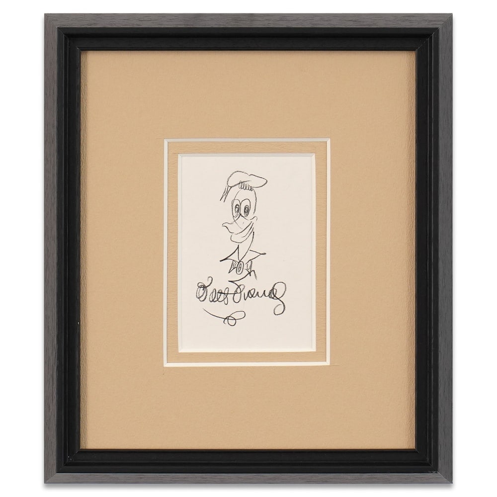 WALT DISNEY SIGNED "DONALD DUCK" CHARACTER SKETCH: Image Dimensions: 5 1/2 x 3 5/8 in (14 x 9.3 cm) Framed Dimensions: 13 3/4 x 12 in (35 x 30.5 cm) Provenance and Authentication: According to the Letter of Authenticity (LOA) and Certificate of