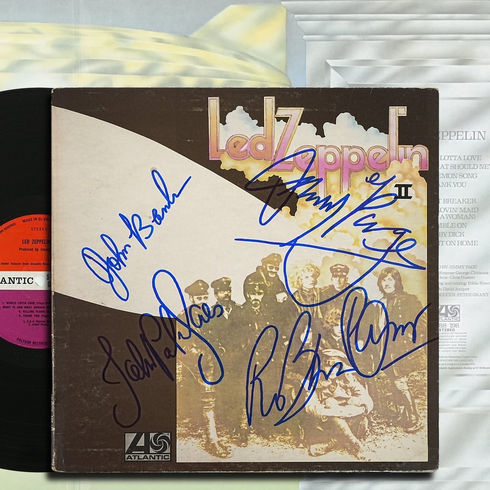 LED ZEPPELIN FULLY SIGNED "LED ZEPPELIN II" UK LP: 12 1/4 x 12 1/4 in Provenance and Authentication: According to the Letter of Authenticity (LOA) and Certificate of Authenticity (COA) provided by the consignor, this collectible was subjected to a