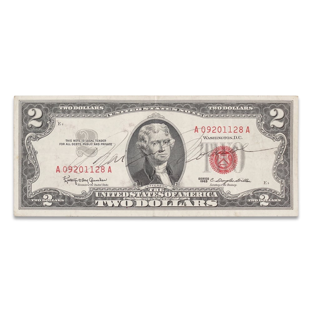 MARILYN MONROE SIGNED 1963 U.S. $2 RED SEAL NOTE: 6 1/8 x 2 5/8 in (15.6 x 6.6 cm) Provenance and Authentication: According to the Letter of Authenticity (LOA) and Certificate of Authenticity (COA) provided by the consignor, this collectible was