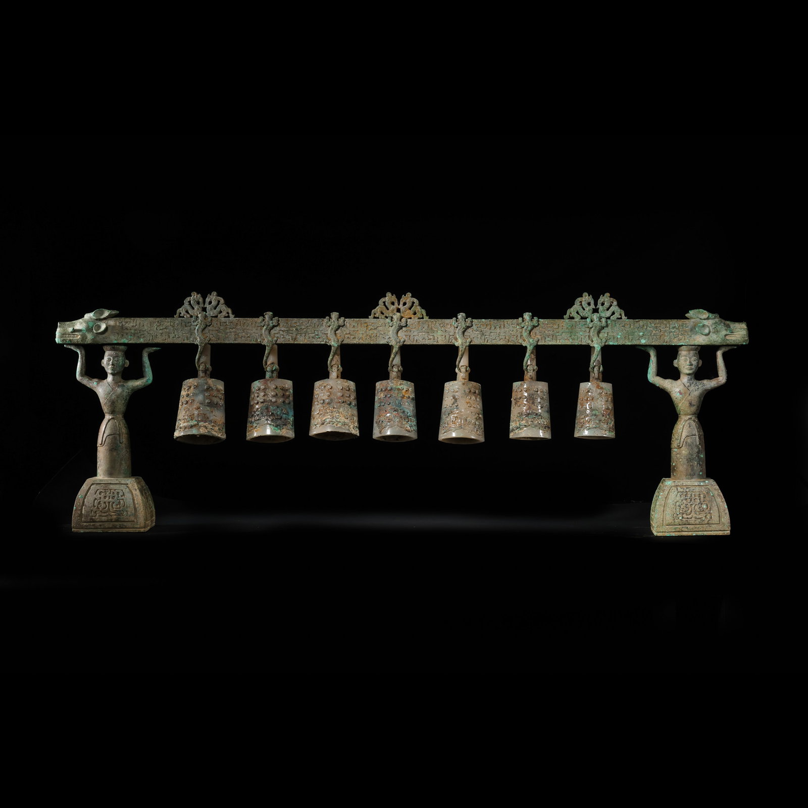 Bronze chime bells inlaid with jade from the Warring States period of China: H. 37.5 cm. W. 118.5 cm. H. 15.5 cm. W. 7 cm. H. 17.5 cm. W. 9.5 cm.