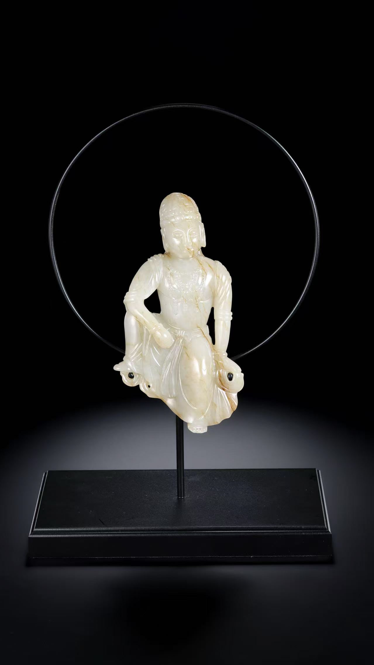 Seated Buddha Statue made of Hetian white jade from the Liao Dynasty, China: H. 16 cm. W. 8.5 cm. Weight. 421 gram.