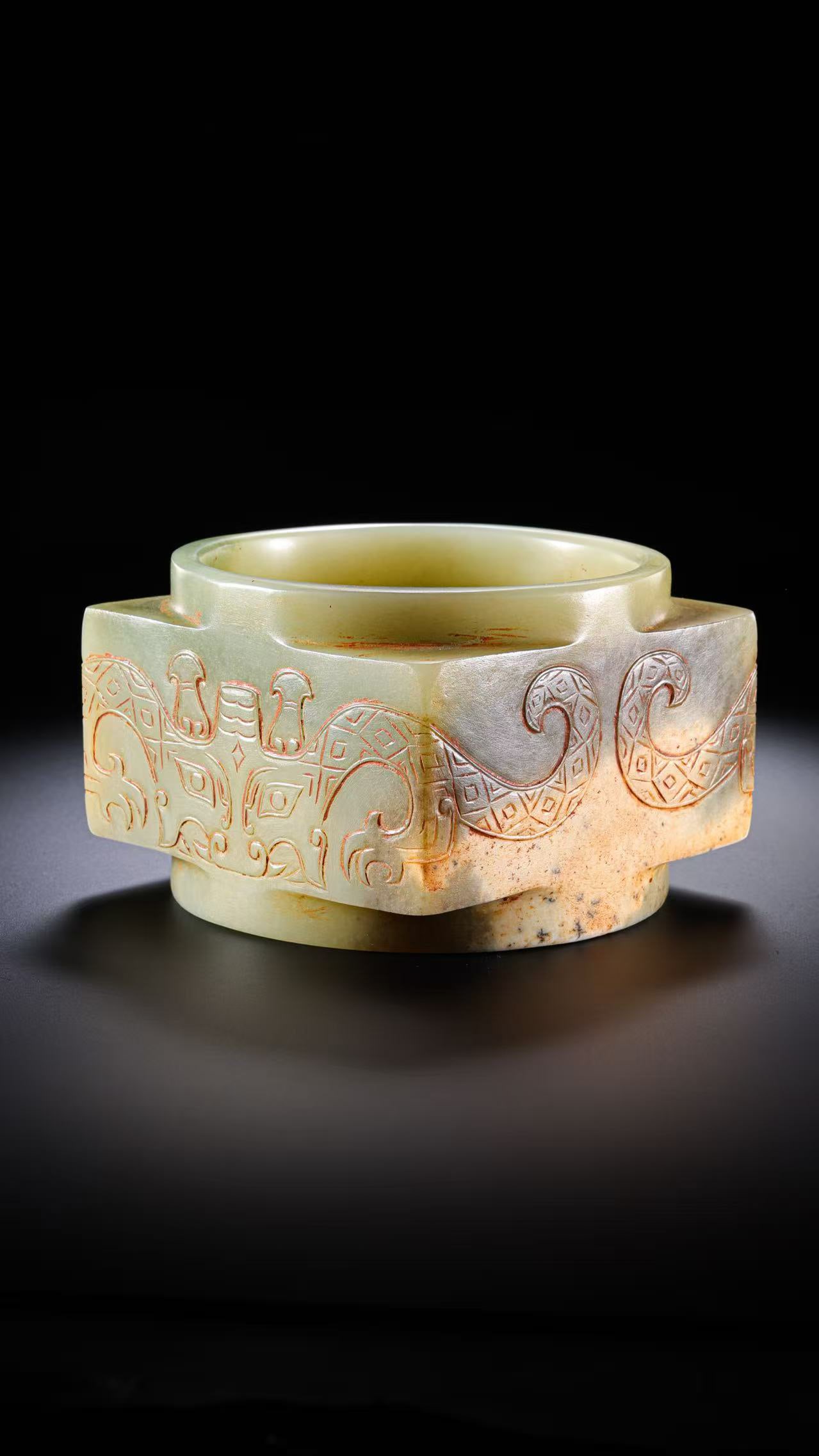 Jade Cong with Animal Mask Pattern from the Neolithic Period in China: H. 6.5 cm. W. 9.5 cm. Weight. 582 gram.