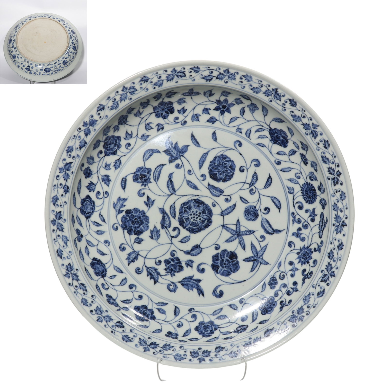 Chinese Yuan Dynasty blue and white porcelain dish with intertwined floral pattern and folded rim: Diam. 43.3 cm.