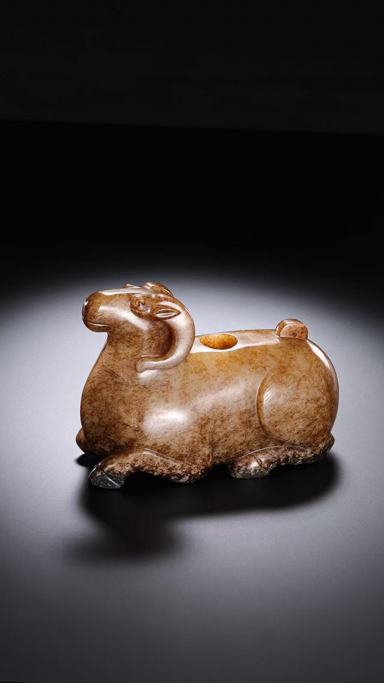 Jade sheep from the Han Dynasty in China: H. 9 cm. W. 13 cm. Weight. 816 gram.