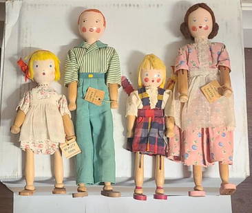 Schoenhut dolls. 1935 american wooden pinn family dolls: Schoenhut dolls. 1935 american wooden pinn family dolls measurments:Large dolls 12" height small dolls 9" height width: both measure 4" from left wood arm to right wood arm