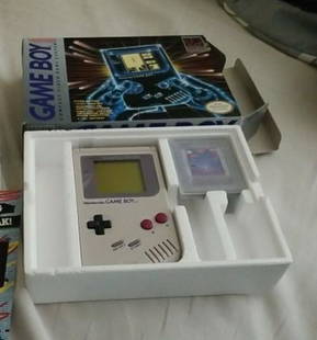 Nintendo Game Boy Launch Edition Gray Handheld System: Nintendo Game Boy Launch Edition worka great! Gray Handheld System With box and paperwork This system features a directional pad, as well as four operation buttons for in-game use. An external power s