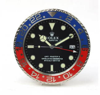 Rolex Style GMT Master II "Pepsi" Dealer Wall Clock: GMT Master II Dealers Wall Clock after Rolex Dealer's style wall clock inspired by the "PEPSI" wristwatch watch series. Quality replica having sweeping quartz movement powered by single AA battery. Be